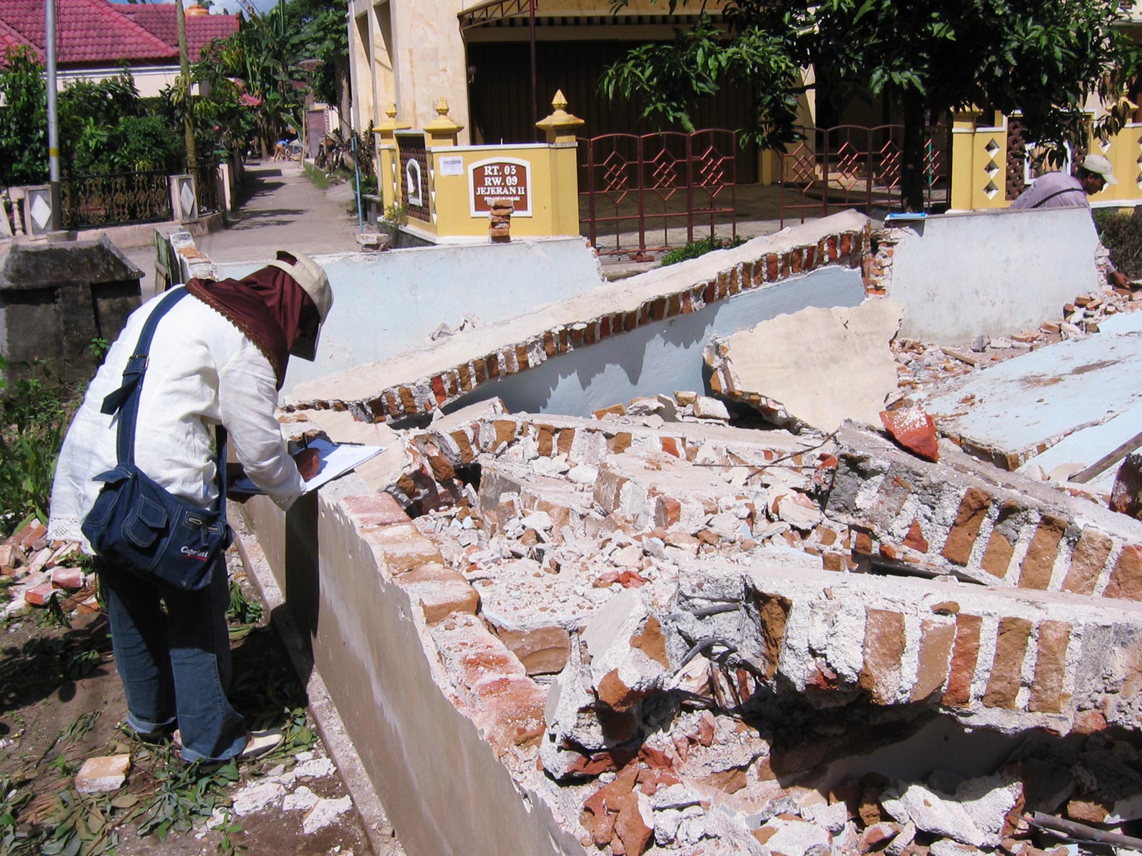 For Building Change engineers, a first step is determining why a building, such as this one in Indonesia, failed in the first place.